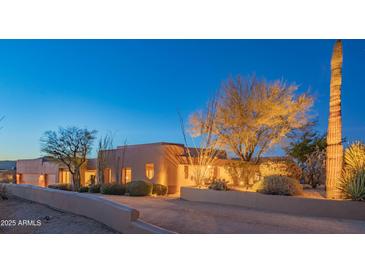 Desert landscape home with stucco exterior, landscaped grounds, and mountain views at 30600 N Pima Rd # 33, Scottsdale, AZ 85266