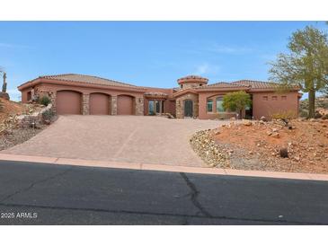 Stunning desert home with three-car garage and brick driveway at 9624 N Copper Ridge Trl, Fountain Hills, AZ 85268