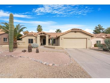 Single-story home with desert landscaping and two-car garage at 17014 E De Anza Dr, Fountain Hills, AZ 85268