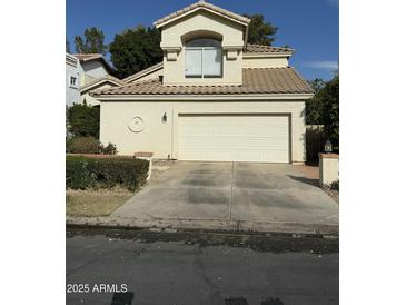 Two-story house with attached two-car garage and landscaping at 2322 S Rogers -- # 9, Mesa, AZ 85202