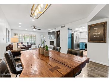 Open concept dining area with kitchen view at 7800 E Lincoln Dr # 1096, Scottsdale, AZ 85250