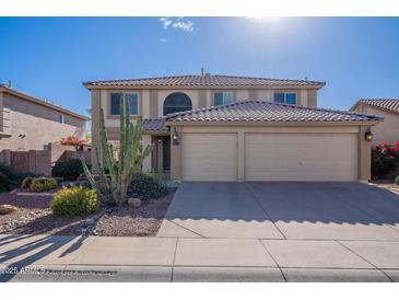 Two-story house with three-car garage and desert landscaping at 4615 E Bent Tree Dr, Cave Creek, AZ 85331