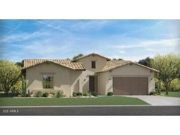 One-story home with tile roof, two-car garage, and desert landscaping at 7584 W Evans Dr, Peoria, AZ 85381