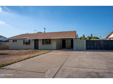 Newly renovated single story home with fresh paint and landscaping at 1010 W 5Th Pl, Mesa, AZ 85201