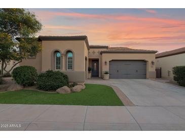 Beautiful single-story home with a two-car garage and landscaped front yard at 1713 E Amaranth Trl, Queen Creek, AZ 85140