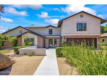 Stunning two-story home with brick accents and landscaped front yard at 5112 N 35Th St, Phoenix, AZ 85018