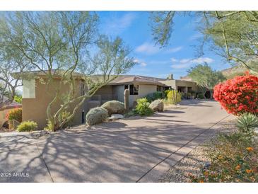 Luxury home with scenic mountain views and a long driveway at 12950 N 119Th St, Scottsdale, AZ 85259