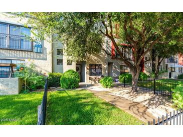 Inviting exterior with well-manicured lawn and walkway at 3427 E Lance Ln, Phoenix, AZ 85018