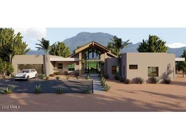 Stunning contemporary home with mountain views and desert landscaping at 3529 S Kings Ranch Ct, Gold Canyon, AZ 85118