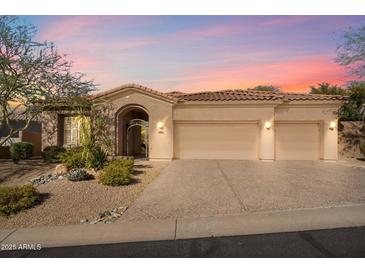 Beautiful desert home with three-car garage and landscaped front yard at 10638 E Blanche Dr, Scottsdale, AZ 85255