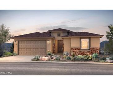 One-story home with brown roof, stone accents, and two-car garage at 17638 W Rancho Dr, Litchfield Park, AZ 85340