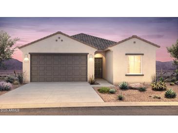 One-story home with two-car garage and desert landscaping at 25144 W Weir Ave, Buckeye, AZ 85326