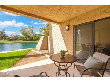 Relaxing patio with lake view and seating area at 5136 N 31St Pl # 614, Phoenix, AZ 85016