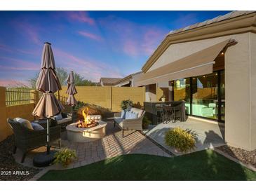 Outdoor patio with fire pit and seating area at 2026 N Atwood --, Mesa, AZ 85207