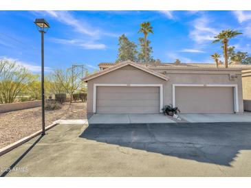 Two-car garage with ample parking space at 4102 E Ray Rd # 1006, Phoenix, AZ 85044