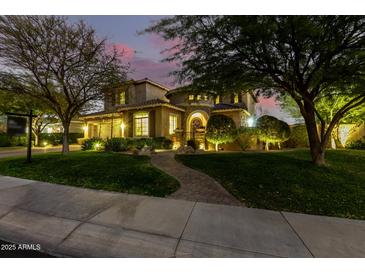 Stunning two-story home with landscaped yard and walkway at 5429 E Barwick Dr, Cave Creek, AZ 85331