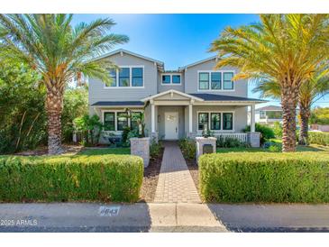 Two-story craftsman home with landscaped yard and brick walkway at 4643 E Montecito Ave, Phoenix, AZ 85018