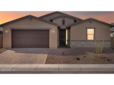 Charming single-Gathering home with a two-car garage and neutral stucco exterior at 4847 W Hunter Trl, San Tan Valley, AZ 85144