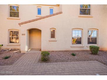 Two-story house with a brick walkway and landscaping at 2613 E Bart St, Gilbert, AZ 85295