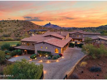 Luxury estate home on a hilltop with mountain and sunset views at 16117 E Shooting Star Trl, Fountain Hills, AZ 85268