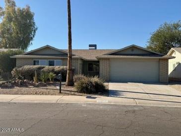 Ranch style home with a two car garage at 11808 S Half Moon Dr, Phoenix, AZ 85044