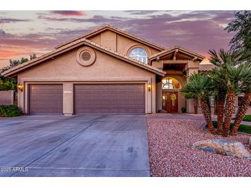 Two-story house with double garage and desert landscaping at 15237 S 19Th Way, Phoenix, AZ 85048