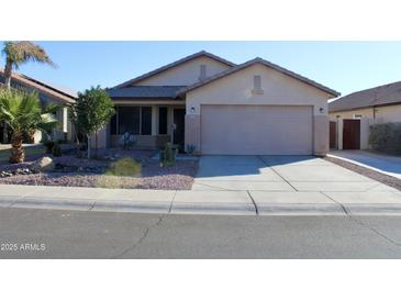 One-story house with desert landscaping and a two-car garage at 22233 N 76Th Dr, Peoria, AZ 85383