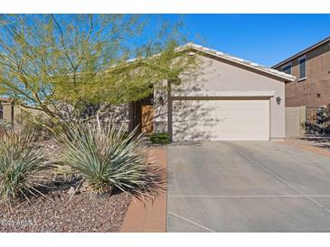 House exterior showcasing a driveway and desert landscaping at 3766 W Jacksonville Dr, Anthem, AZ 85086