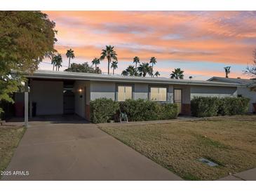 Ranch style home with carport and landscaped yard at 4601 N 75Th St, Scottsdale, AZ 85251