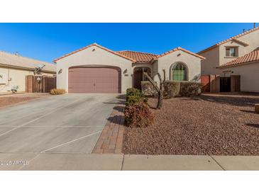 One-story house with a two-car garage and well-maintained landscaping at 3667 S 185Th Dr, Goodyear, AZ 85338