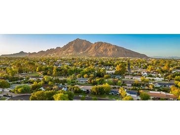 Aerial view of a residential neighborhood with mountain backdrop at 5439 E Arcadia Ln, Phoenix, AZ 85018