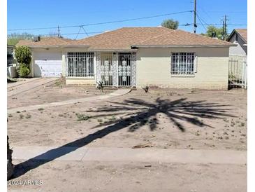 Ranch style home with a large yard and mature landscaping at 2160 E Corona Ave, Phoenix, AZ 85040