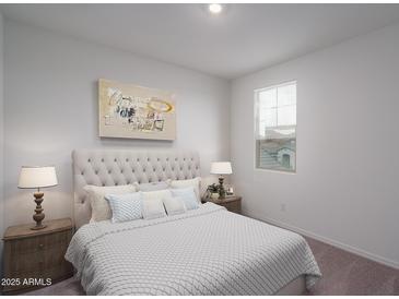 Bright bedroom with a queen bed and neutral decor at 2700 N 216Th Ave, Buckeye, AZ 85396