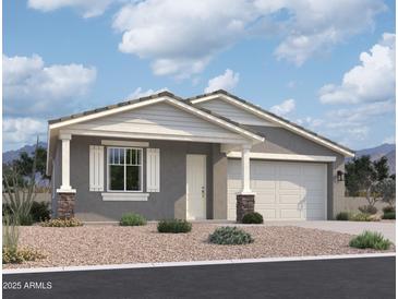 Single-story home with gray siding, white trim, and a two-car garage at 7689 W Smoketree Dr, Peoria, AZ 85383