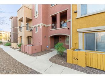 Exterior of a two-story townhome with a walkway at 900 S 94Th St # 1001, Chandler, AZ 85224