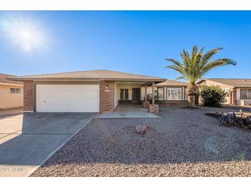 Charming single story home with a two-car garage and desert landscaping at 1722 Leisure World --, Mesa, AZ 85206