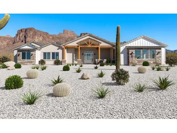 Stunning modern farmhouse exterior with mountain views and desert landscaping at 39015 N 6Th Dr, Phoenix, AZ 85086