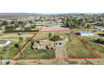 Aerial view showing a house on a large lot, with property boundaries outlined at 19320 W Melvin St, Buckeye, AZ 85326