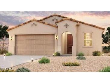 Single-story home with a two-car garage and desert landscaping at 24636 W Hopi St, Buckeye, AZ 85326