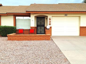 Attractive single-story home with a two-car garage and nicely landscaped front yard at 8020 E Keats Ave # 269, Mesa, AZ 85209