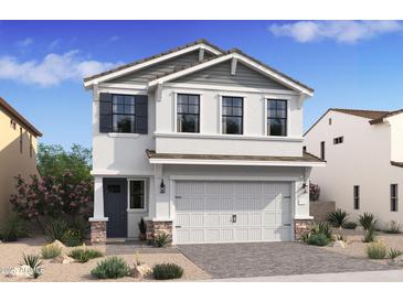 Two-story home with gray and white siding, shutters, and a two-car garage at 2036 N Woodburne Pl, Chandler, AZ 85224