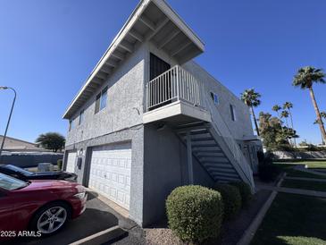 Two-story building with attached garage and balcony at 2629 W Ocotillo Rd # 3, Phoenix, AZ 85017