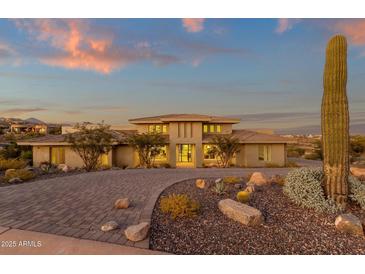 Stunning desert contemporary home with a large front yard and beautiful landscaping at 10031 N Palisades Blvd, Fountain Hills, AZ 85268