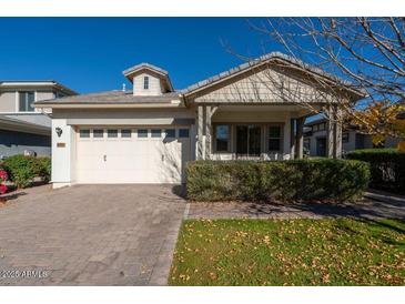 One-story home with a covered porch and attached two-car garage at 3146 E Sagebrush St, Gilbert, AZ 85296