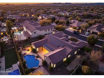 Luxury home with pool and solar panels; desirable community location at 2207 W Hidden Treasure Way, Phoenix, AZ 85086