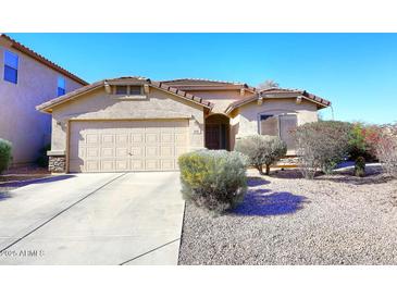 Single-story home with two-car garage and desert landscaping at 6808 S 36Th Dr, Phoenix, AZ 85041