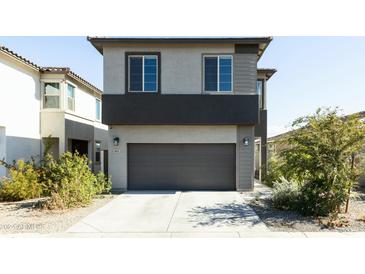 Modern two-story home with attached garage and landscaped front yard at 4831 S Molly --, Mesa, AZ 85212