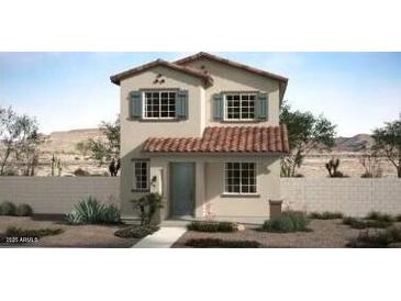 Two-story house with Spanish-style tile roof and landscaped front yard at 15604 S 181St Dr, Goodyear, AZ 85338