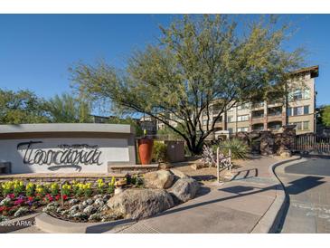 Gated community entrance with landscaping and signage at 5350 E Deer Valley Dr # 4434, Phoenix, AZ 85054