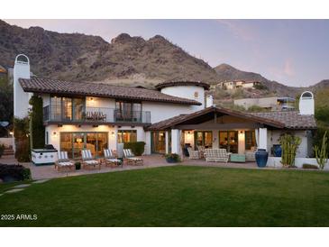 Stunning two-story home with mountain views and a spacious backyard at 7348 N Red Ledge Dr, Paradise Valley, AZ 85253